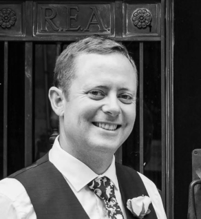 This is me wearing a dinosaur tie on my wedding day in Jan 2019